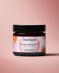Microdermabrasion Facial Jar on Pink Background