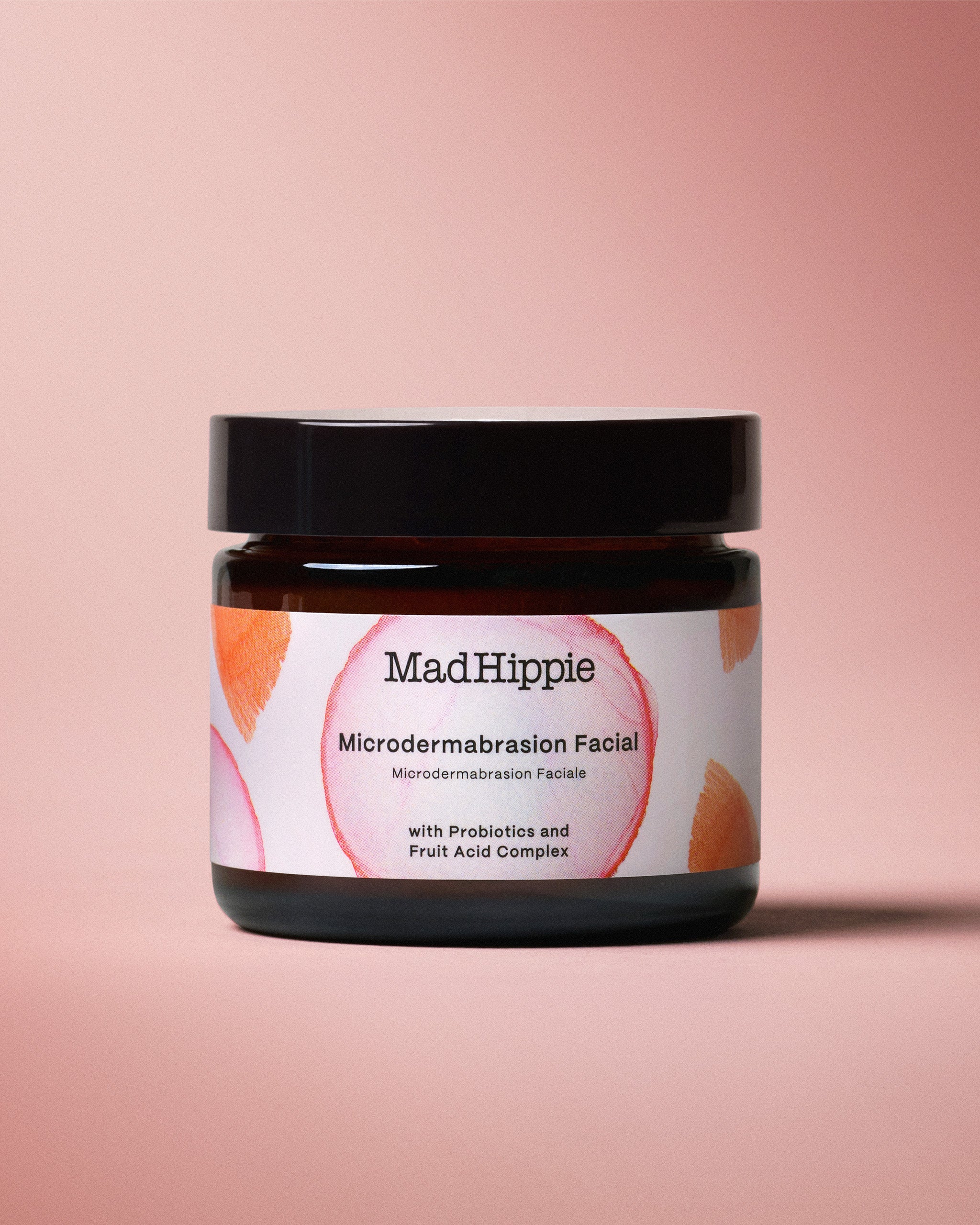 Microdermabrasion Facial Jar on Pink Background