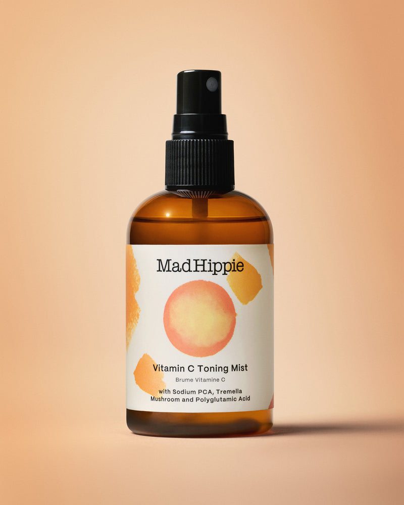 Vitamin C Toning Mist Bottle on Peach Background